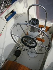 View of helm with autopilot and windvane connected